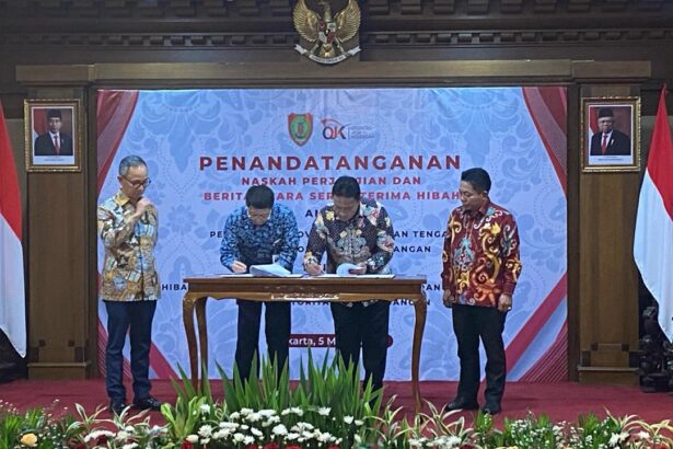 Dukung Pelaksaan Tugas Ojk Wagub Tanda Tangani Naskah Perjanjian Hibah.jpg