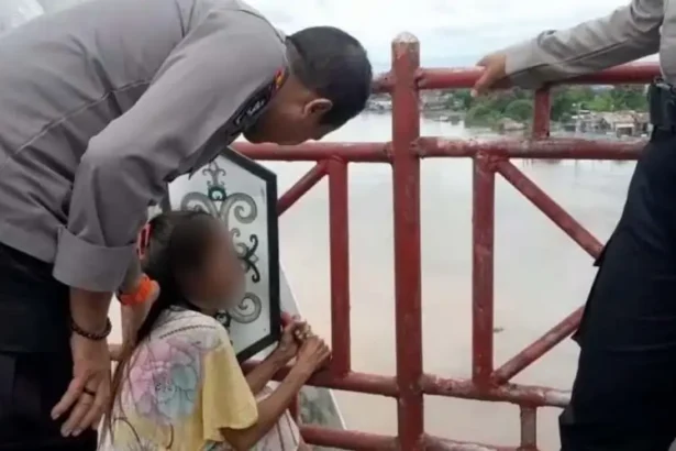 Terjun Di Jembatan Kahayan