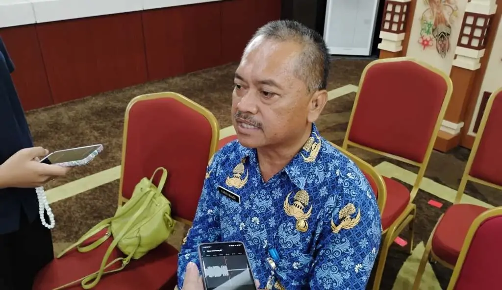Kepala disnakertrans Kalimantan Tengah, Farid Wajdi phk karyawan hotel
