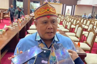 Juni Gultom Pupr